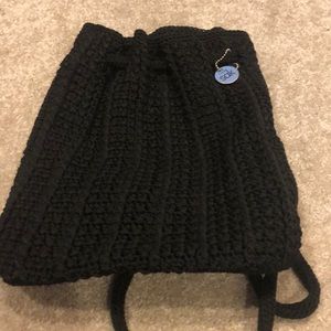 Black crocheted mini backpack style bag